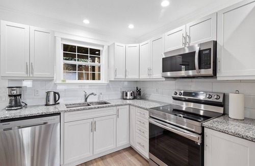 Downtown St. John's House | Wood House King Bd 2 Queens Fire Pit