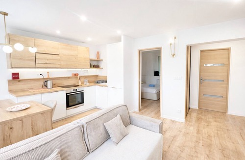 Mons-en-Baroeul Apartment | Wood & Light Escapade