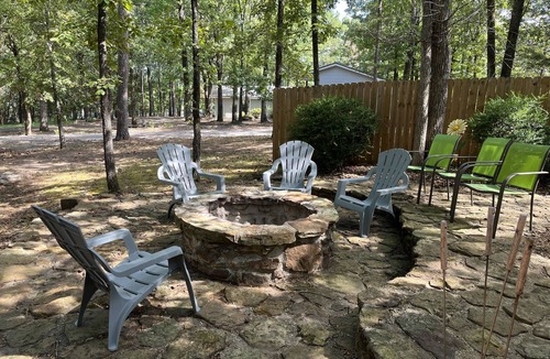 Greers Ferry House | Wooded Bliss on 1 acre with lake access across the street and sleeps up to 10!