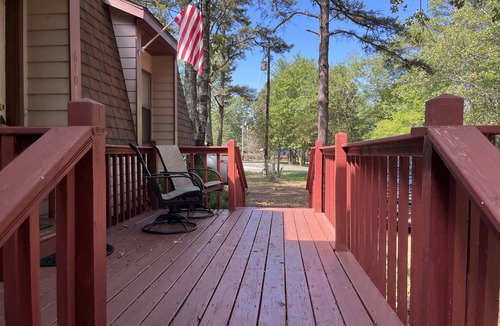 Greers Ferry House | Wooded Bliss on 1 acre with lake access across the street and sleeps up to 10!