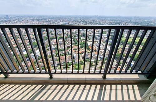 Pondok Aren Apartment | Wooden Accents 1Br Without Living Room At Bintaro Embarcadero Apartment