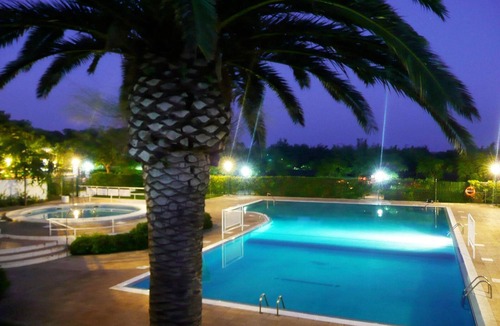 Miami Platja House | Wooden bungalow near beach with pool, parking and pets allowed