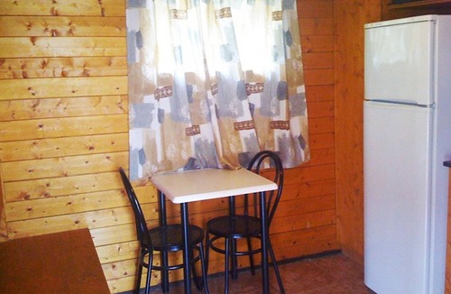 Miami Platja House | Wooden Bungalow with Direct Beach Access, Entertainment, and Pets Allowed