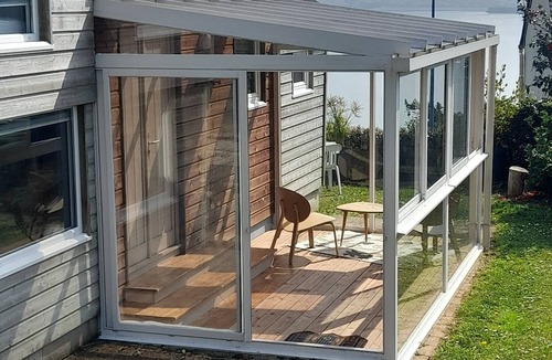 Roscanvel Ski Chalet | Wooden chalet, sea view, lovely garden, 5-minute walk to the beach. Dogs welcome.
