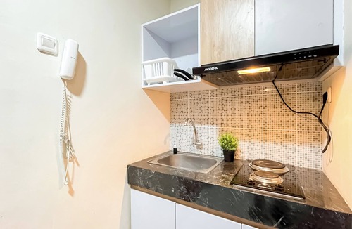 Pondokcina Apartment | Wooden Nest 2Br Without Living Room At Evenciio Margonda Apartment