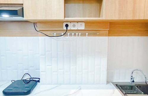 Biringkanya Apartment | Wooden Touch Studio At Tamansari Skylounge Makassar Apartment
