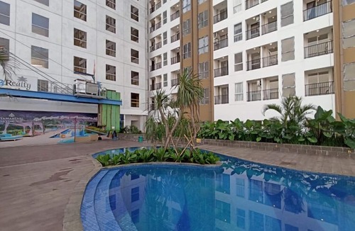 Biringkanya Apartment | Wooden Touch Studio At Tamansari Skylounge Makassar Apartment