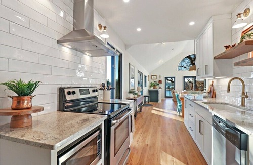 East Troy House | Woodhaven on Pleasant Lake |Pleasant Lake |Lakefront |Wraparound Deck |Views |Dock |Kayaks & Boards