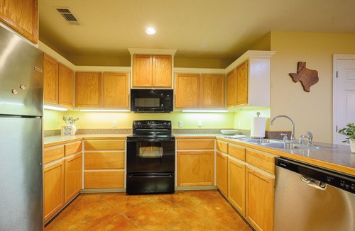 Tomball House | Woodside Charm: Comfort & Serenity in the Trees