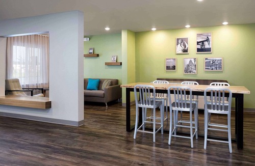 Canyon Acres Hotel | WoodSpring Suites Albuquerque East I-40 Tramway