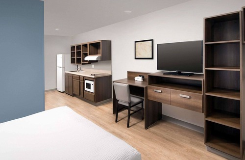 Canyon Acres Hotel | WoodSpring Suites Albuquerque East I-40 Tramway