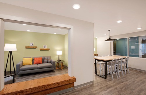 Plano Hotel | WoodSpring Suites Dallas Plano Central Legacy Drive