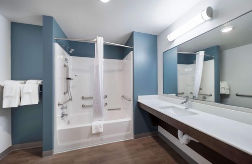 Plano Hotel | WoodSpring Suites Dallas Plano Central Legacy Drive