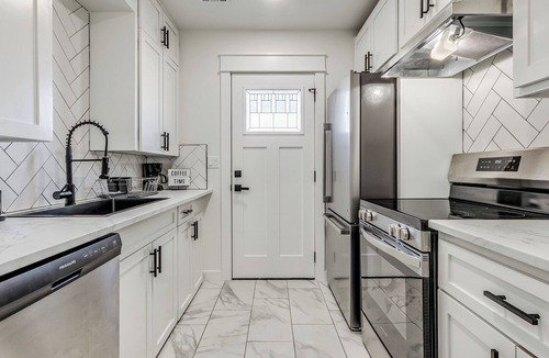 Bartlesville Apartment | Work, Rest & Recharge – Downtown Home w/Washer & Dryer