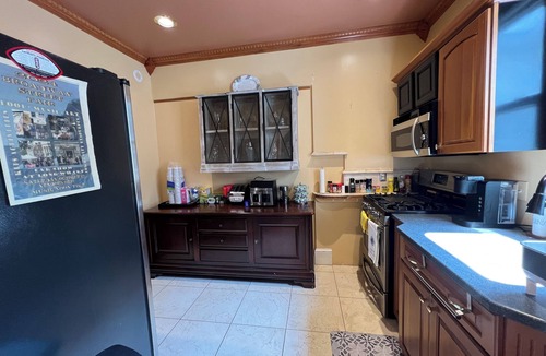 Historic Hill Condo | Wrap around deck with sunset view