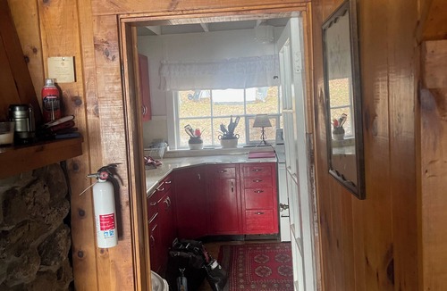 Poultney Cabin | Wyldwood Lodge, on the lakeshore with views of the water & Green Mountains of VT