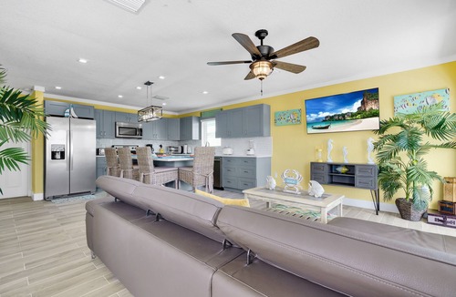 Sunrise Point House | Yellow 3 Story Home
