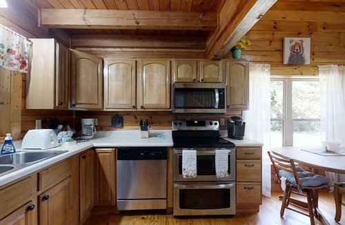 Newport Cabin | Yellow Cabin on the River by RedAwning