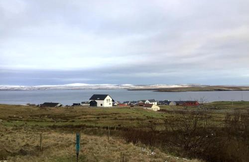 Shetland Islands House | Yellow house on the hill