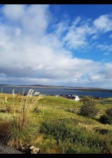 Shetland Islands House | Yellow house on the hill