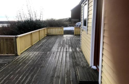 Shetland Islands House | Yellow house on the hill