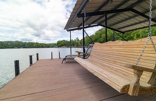Martin House | Young@Hart is a Lakefront home w/Covered Dock, Game Room, 4 Kayaks & Hot Tub!