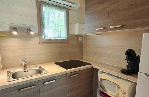 Montlaur Ski Chalet | ZEcamping 3* piscine couverte chalet TV BBQ clim 29m2 4 pers