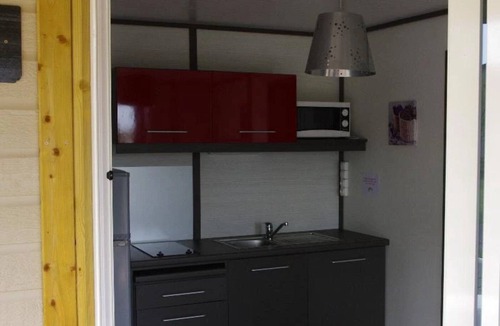 Caro Ski Chalet | ZEcamping 4* animé piscine couverte pet friendly sauna locatif TV 28m2