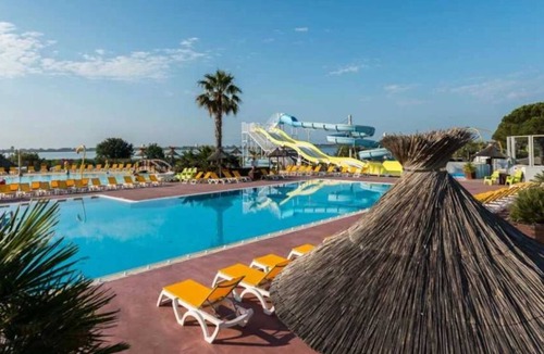 Lattes House | ZEcamping 4* toboggans club enfant locatif clim 36m2 8 pers