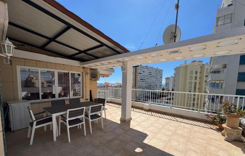 Ático con terraza y vistas al mar