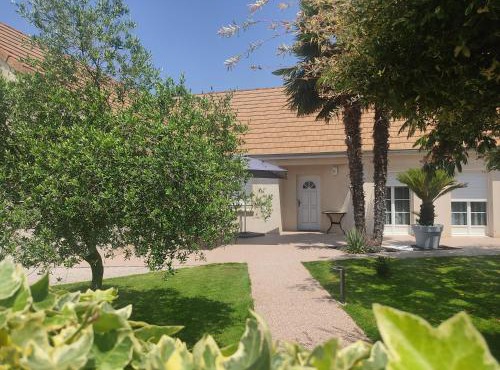 Étape premium Suite familiale & recharge VE Parking