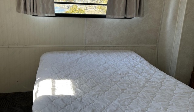 #0 Enjoy a waterfront view from your own trailer with a deck & sunroom