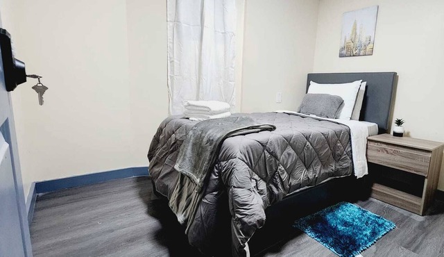 #06 Basement Room With Twin Bed + TV in Angora