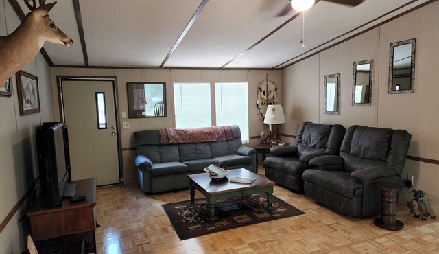 1-1/2 acre Park like wooded setting. Clean 3/2 with plenty of parking.