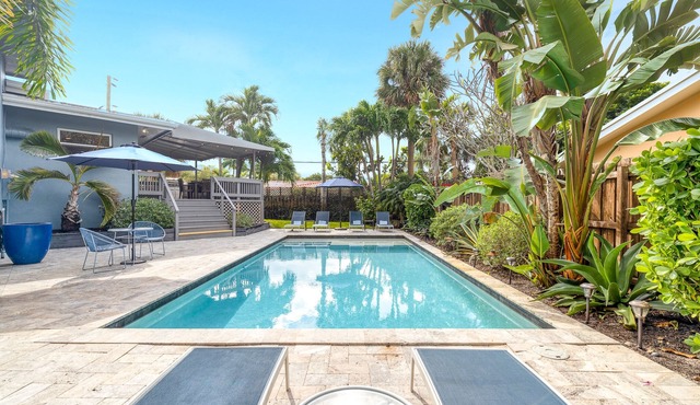 1.5 MILES FROM BEACH WITH HEATED POOL