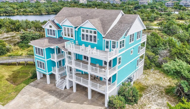 1-acre waterfront oasis with pool, hot tubs & sunrise/set views - dog-friendly