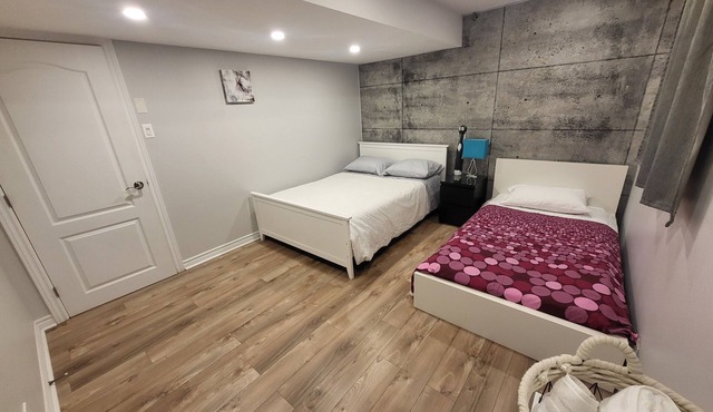 1-bdrm basement unit (full bathroom/shared laundry)