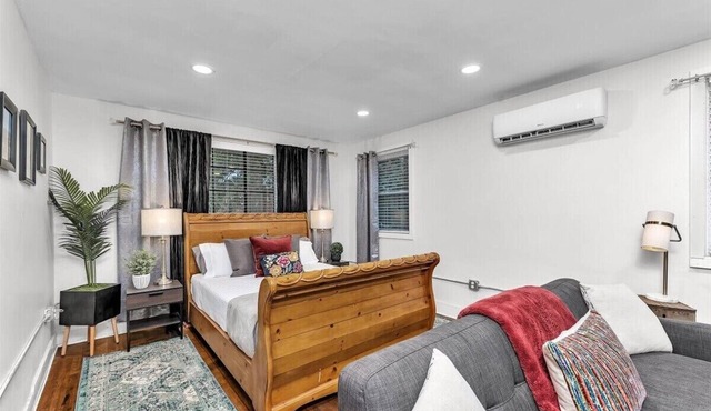1 bed 1 bath home that sleeps max 4 guests with sleeping arrangements being a queen bed and a fold out couch that is queen sized.