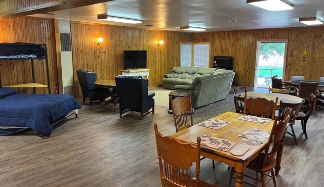 1-bedroom family get away house with huge open living area, and six beds.