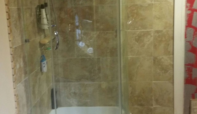 1 BEDROOM FURNISHED STUDIO WITH NEW LUXURIOUS PILLOW TOP QUEEN SiZE BED