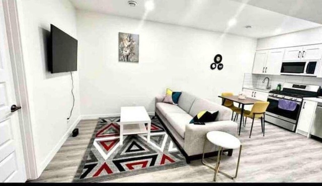 1 BR, walk-out basement with EV charging