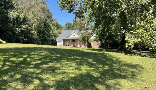 1 extra large bedroom in the woods with pool table and hot tub.