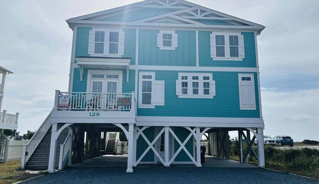 1 Fine Day, a 4BR oceanfront retreat in Holden Beach, sleeps 10 with stunning views.