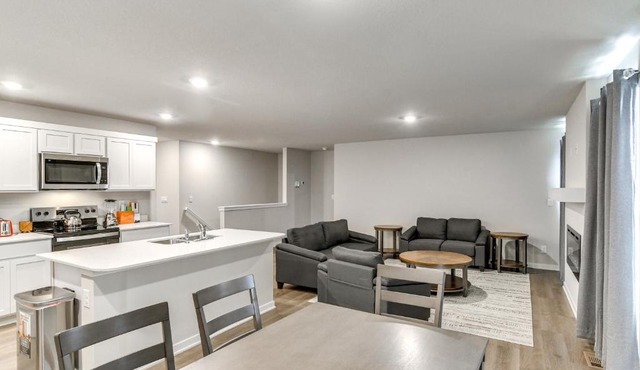 1 Mi to Golf Quiet Waukee Home with Fireplace!