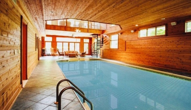 10,000 Sq. Ft. Home on 15 hunting acres with an in-door pool and sauna