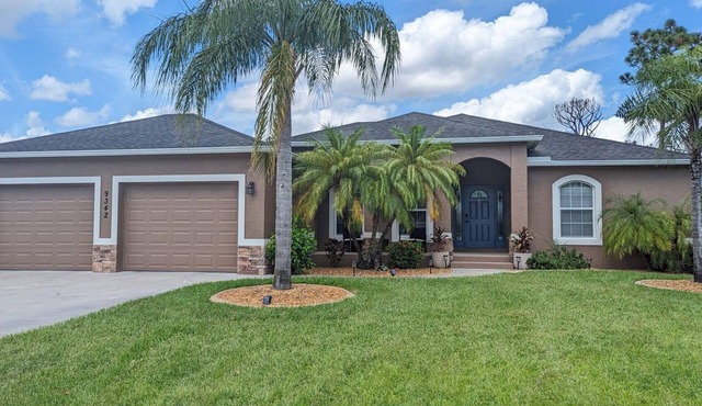 10 Minutes to Beach Bliss, with Heated Privet Poolside Haven!