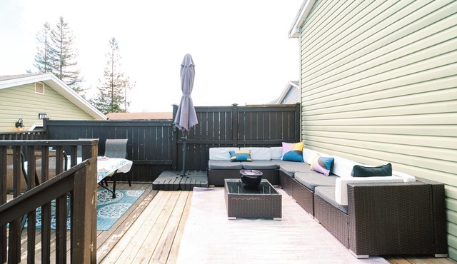 10 minutes to downtown or the beach! Stylish home with large backyard and deck.