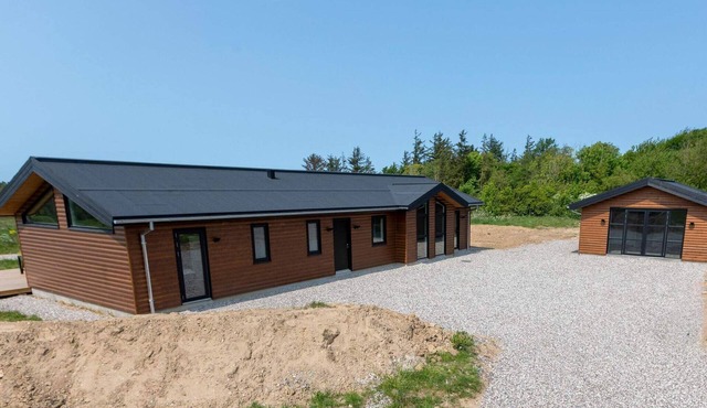 10 person holiday home in Saltum-By Traum