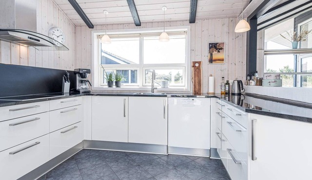 10 person holiday home in Henne