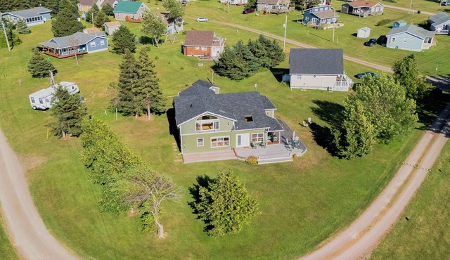 100 steps out front to your red sandy beach!